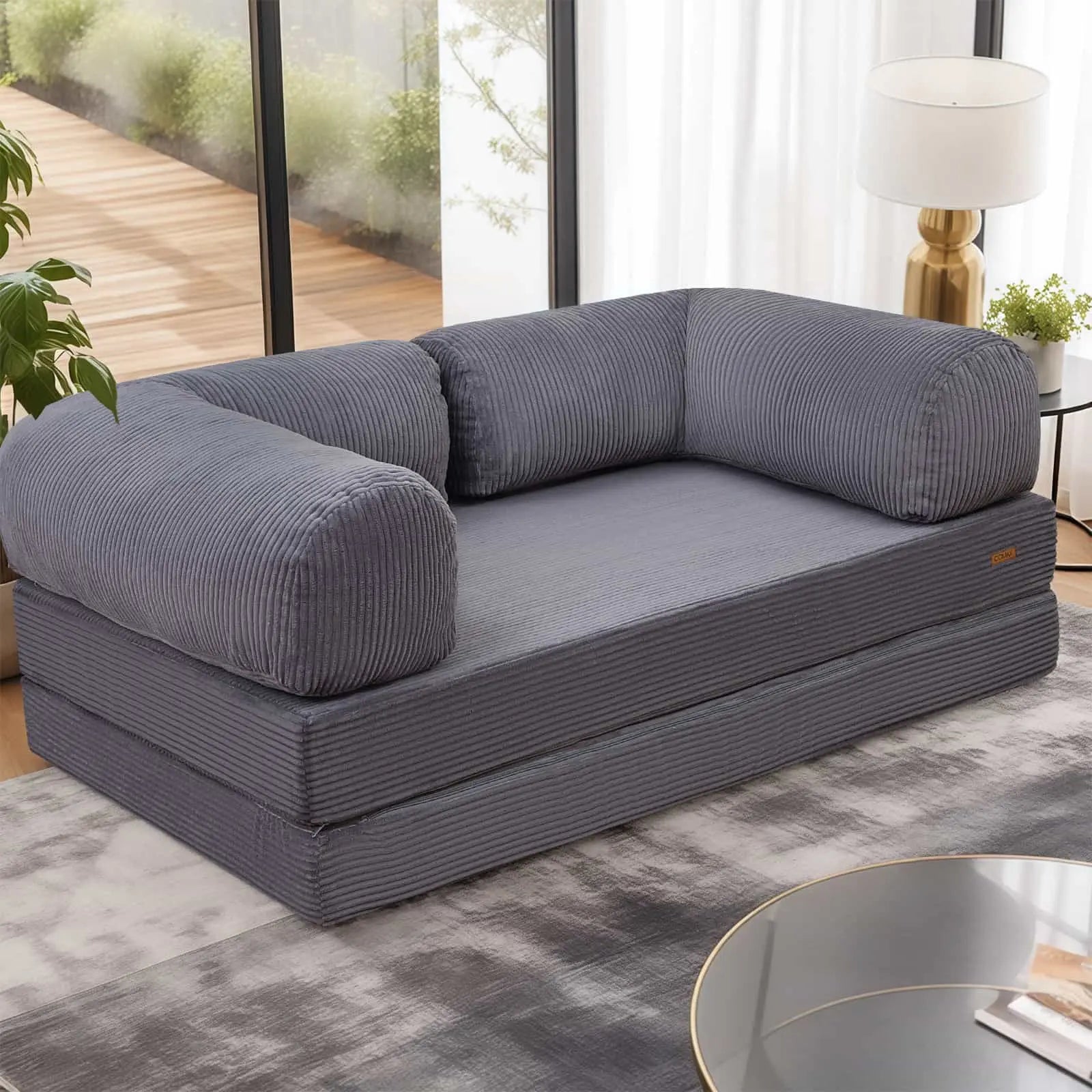 COMAX Floor Couch Bed folds into a sofa